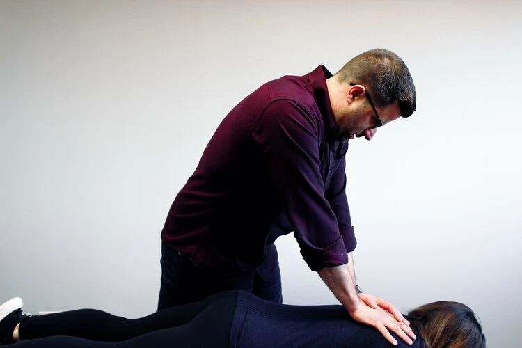 person receiving chiropractic adjustment